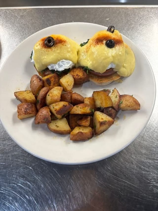 Eggs Benedict Canadian Bacon w Florentine.